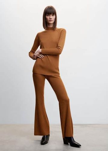 Pantaloni maglia scampanati
